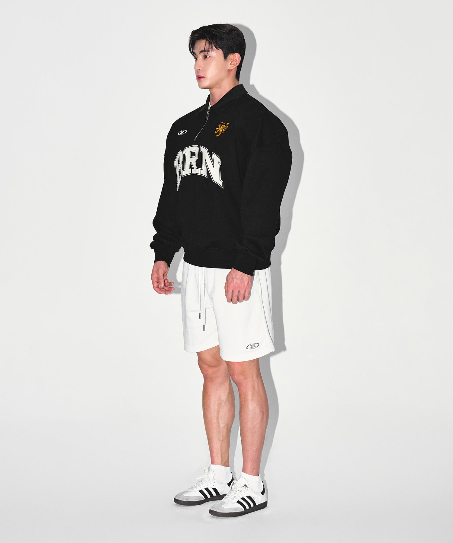BRN ARCH HALF ZIP UP SWEATSHIRTS [BLACK]